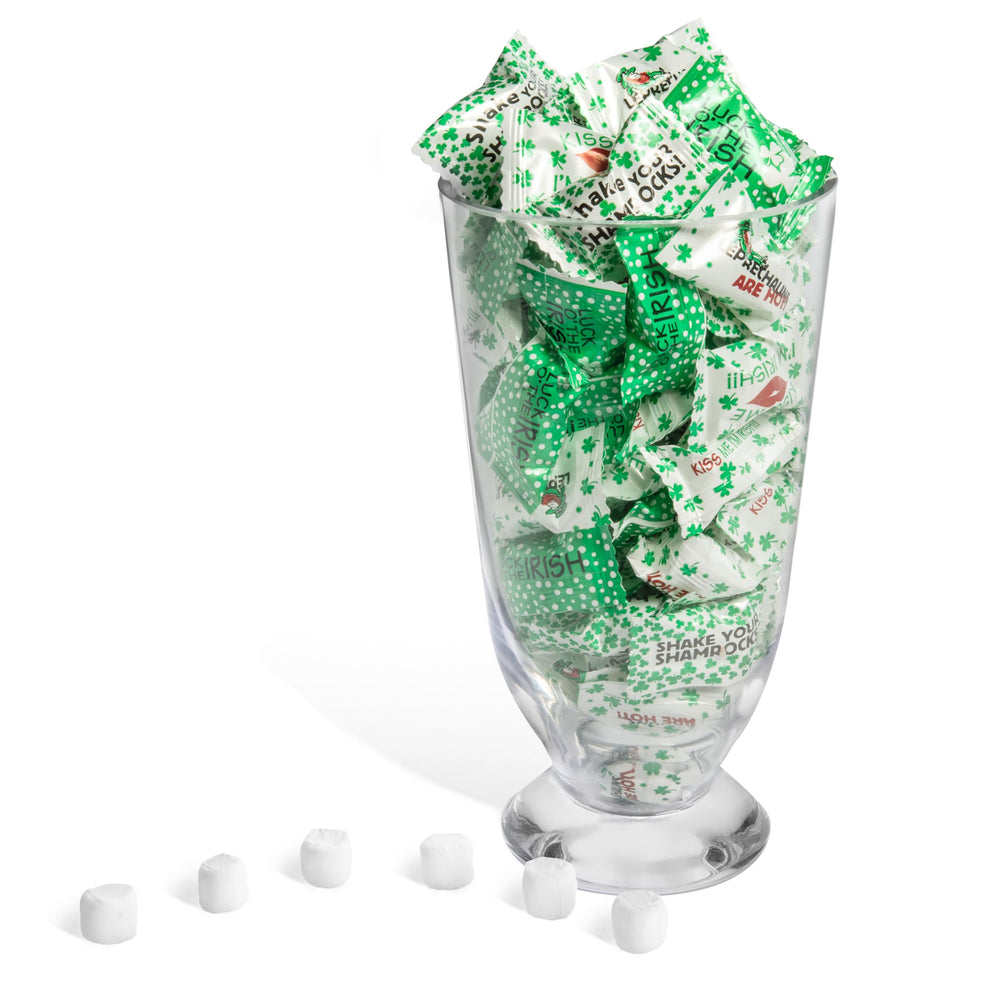 Candy Envy party table display with mint bowls for events.