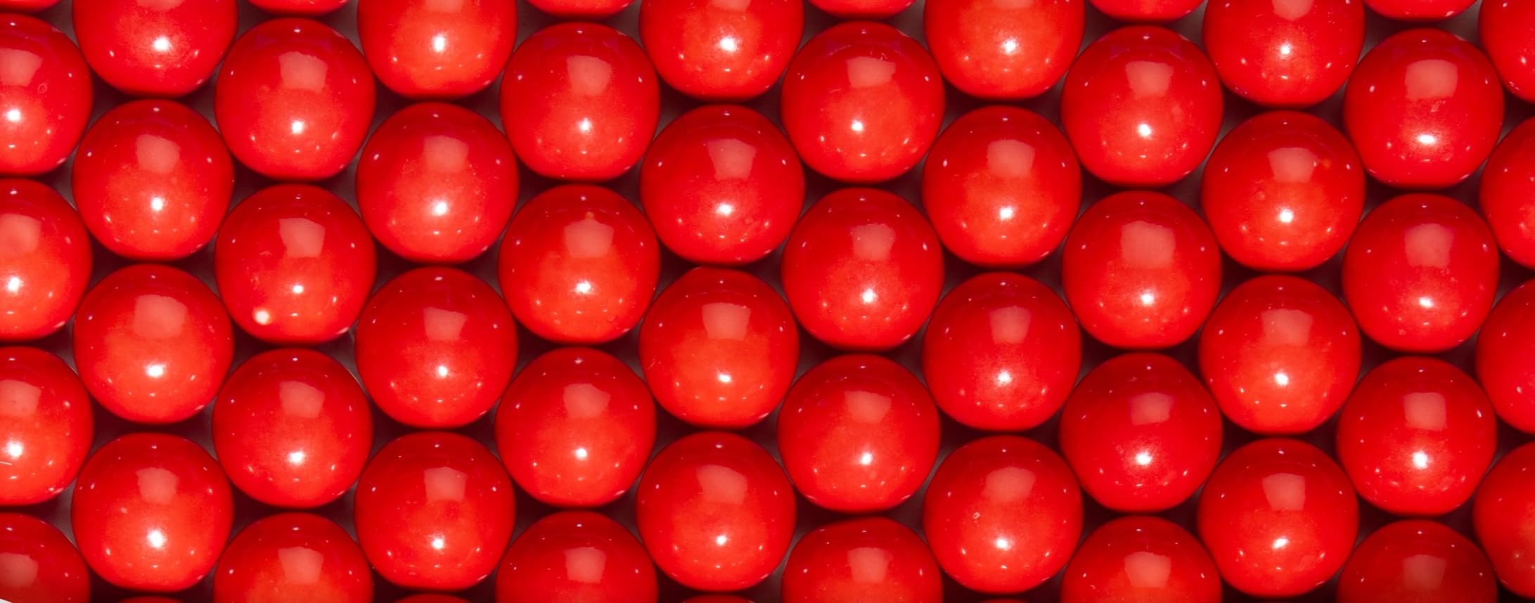 Candy Envy red 1-inch gumballs ingredients label for transparency.