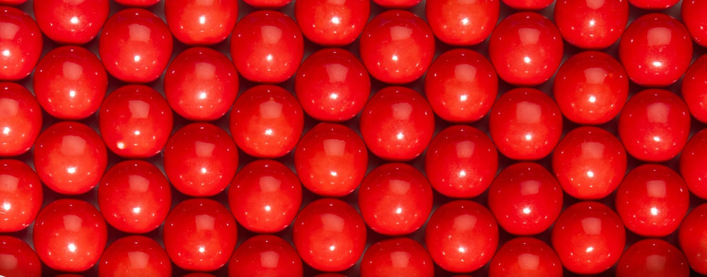Candy Envy red 1-inch gumballs ingredients label for transparency.