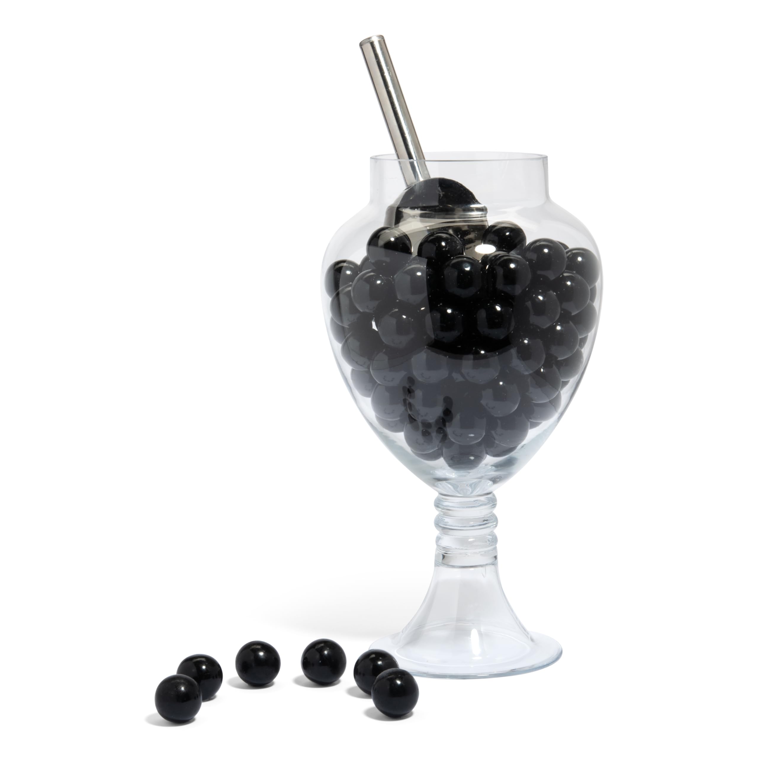 Candy Envy shiny black gumballs close-up reveal smooth coating