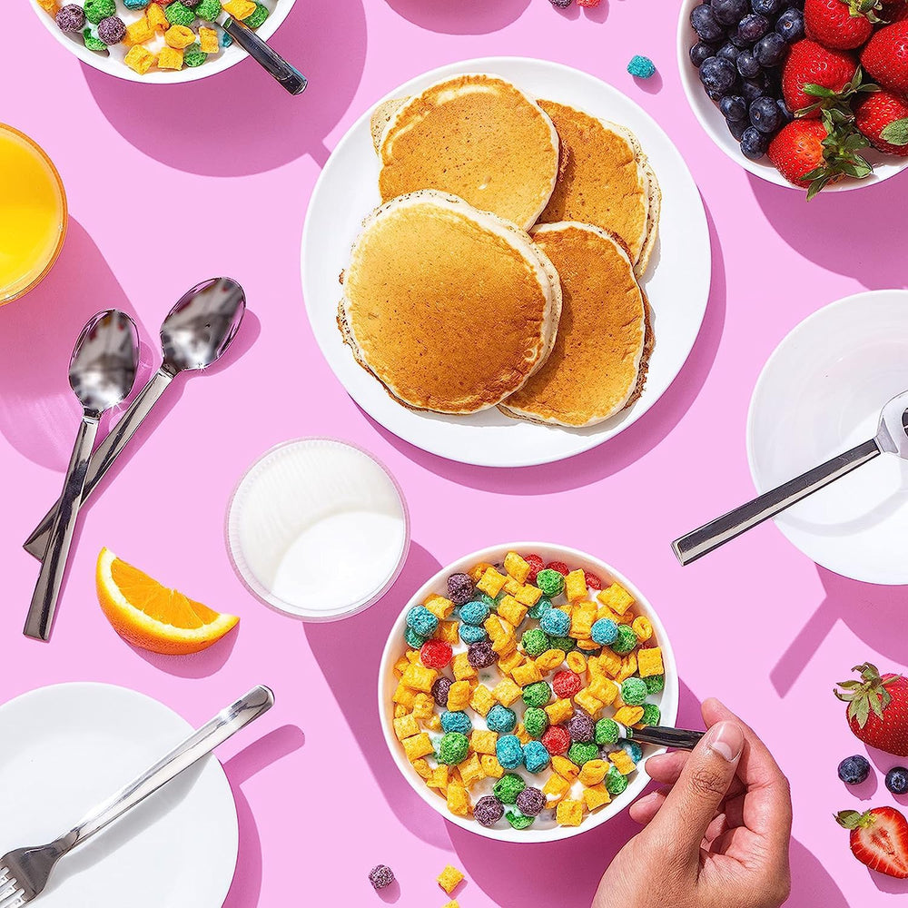 Cap'n Crunch Crunchberries cups with bowl and fruit for balanced mornings.