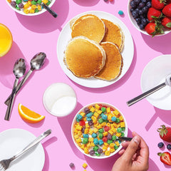 Cap'n Crunch OOPS All Berries cup with milk ready for a quick breakfast