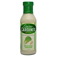 Cardini's Caesar dressing bottle highlighting creamy texture for salads.