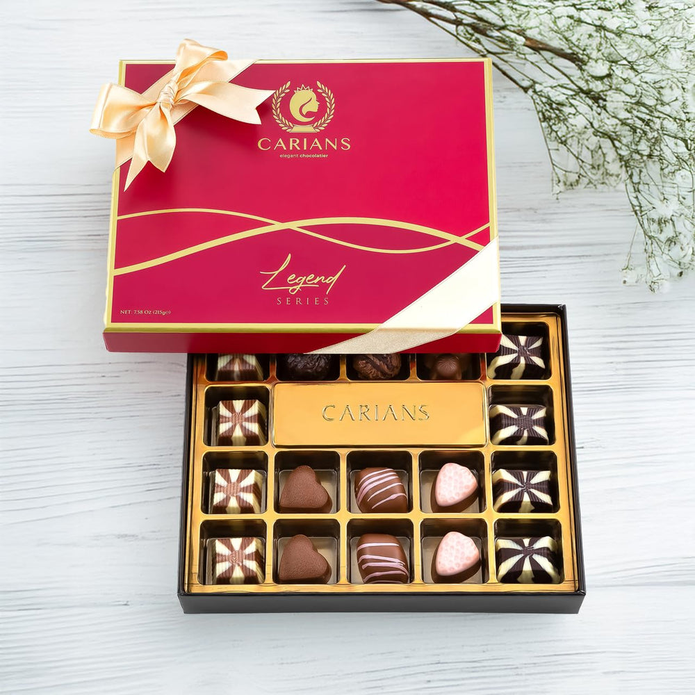Carian's Bistro Chocolatier dark, milk, white chocolates close-up showing glossy shells.