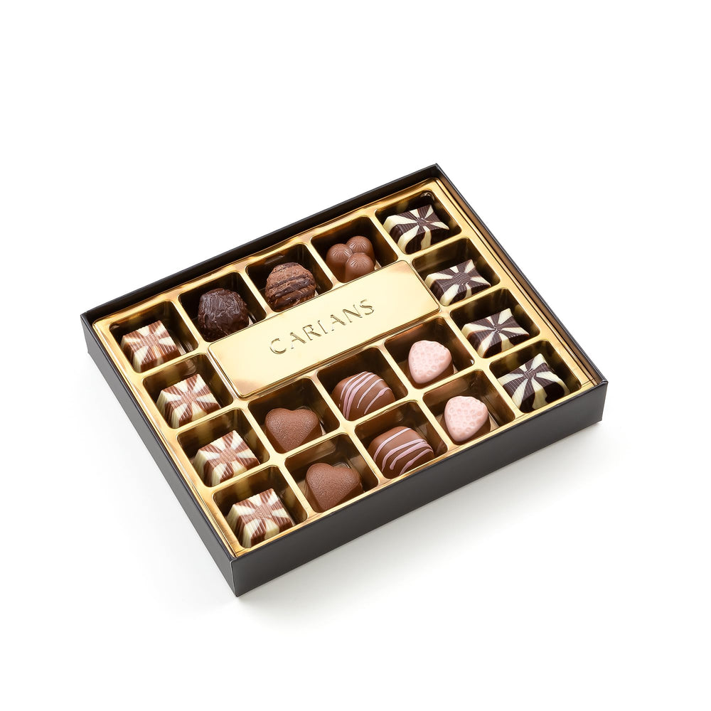Carian's Bistro Chocolatier gift box with red ribbon ready for special moments.