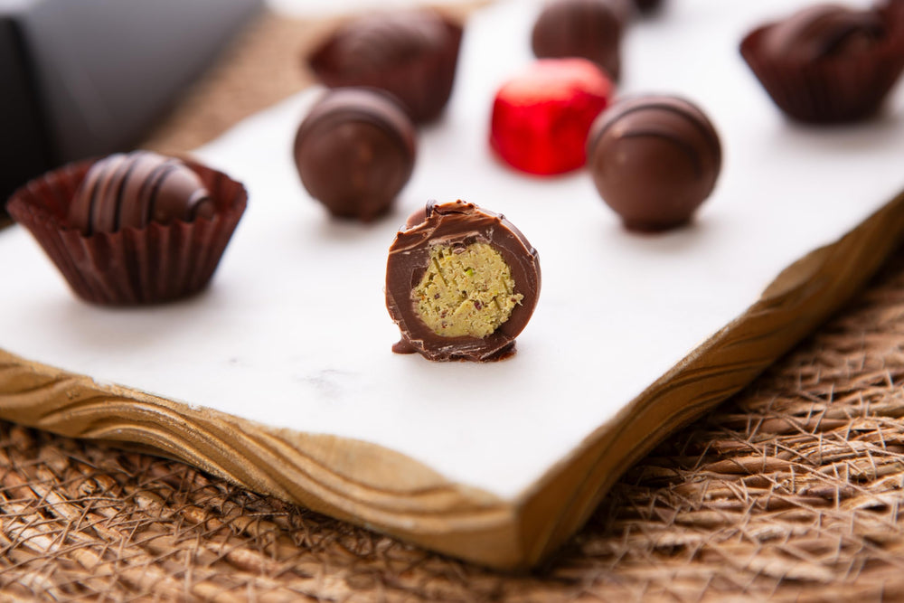 Carian's Bistro dark and milk chocolate truffles on display.