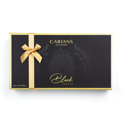 Carian's Bistro milk chocolate truffle closeup, creamy center for a velvety bite