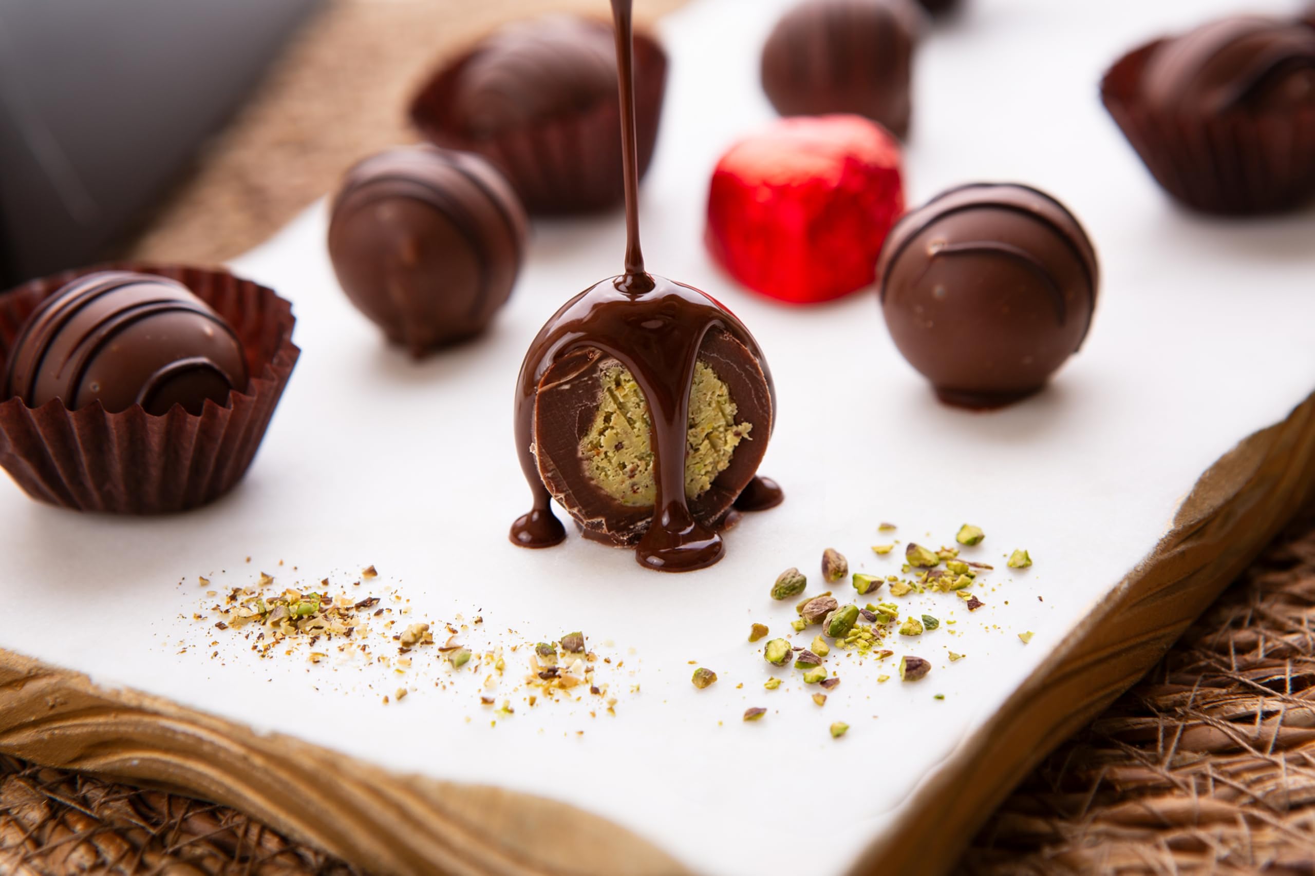 Carian's Bistro pistachio and kunafa truffle highlighting rich textures.