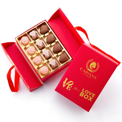 Carian's Bistro Valentine’s Box of Love gift box with gold ribbon, perfect for gifting.