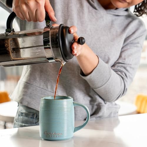 Caribou Coffee Caribou Blend 20-ounce bag ready for use