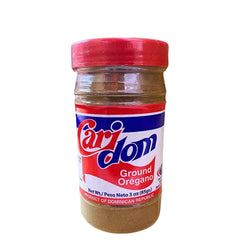 Caridom ground oregano jar enhances sauces and meats with vibrant Dominican flavor.