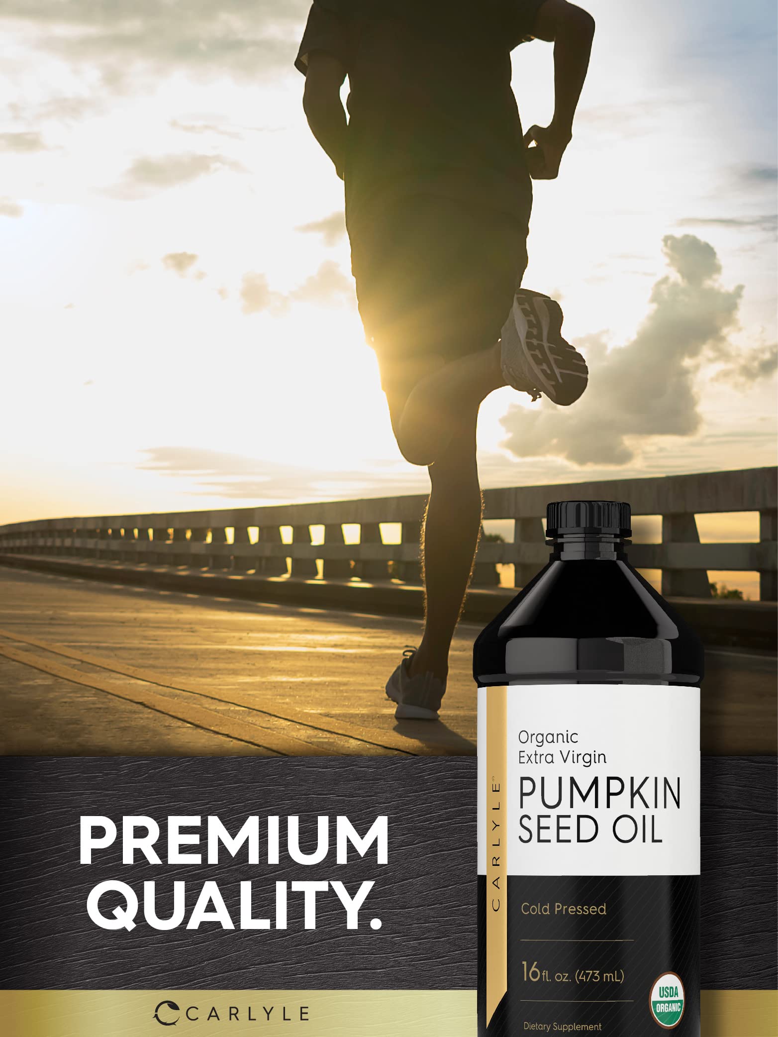 Drizzle of Carlyle pumpkin seed oil on a fresh salad with brand visible.