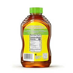 Carmichael's Organic Honey jar close-up highlighting purity and texture