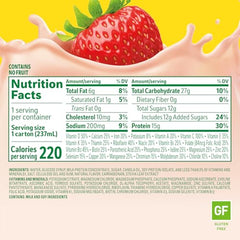 Carnation High Protein strawberry glass angled for ready breakfast boost