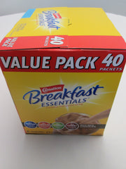 Carnation Breakfast Essentials Rich Milk Chocolate shake ready in a glass for energy.