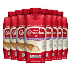 Carnation lactose-free evaporated milk bottle shows creamy texture for cooking