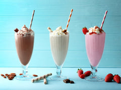 Blender-ready Malted Milk Chocolate shake using Carnation for a creamy beverage.