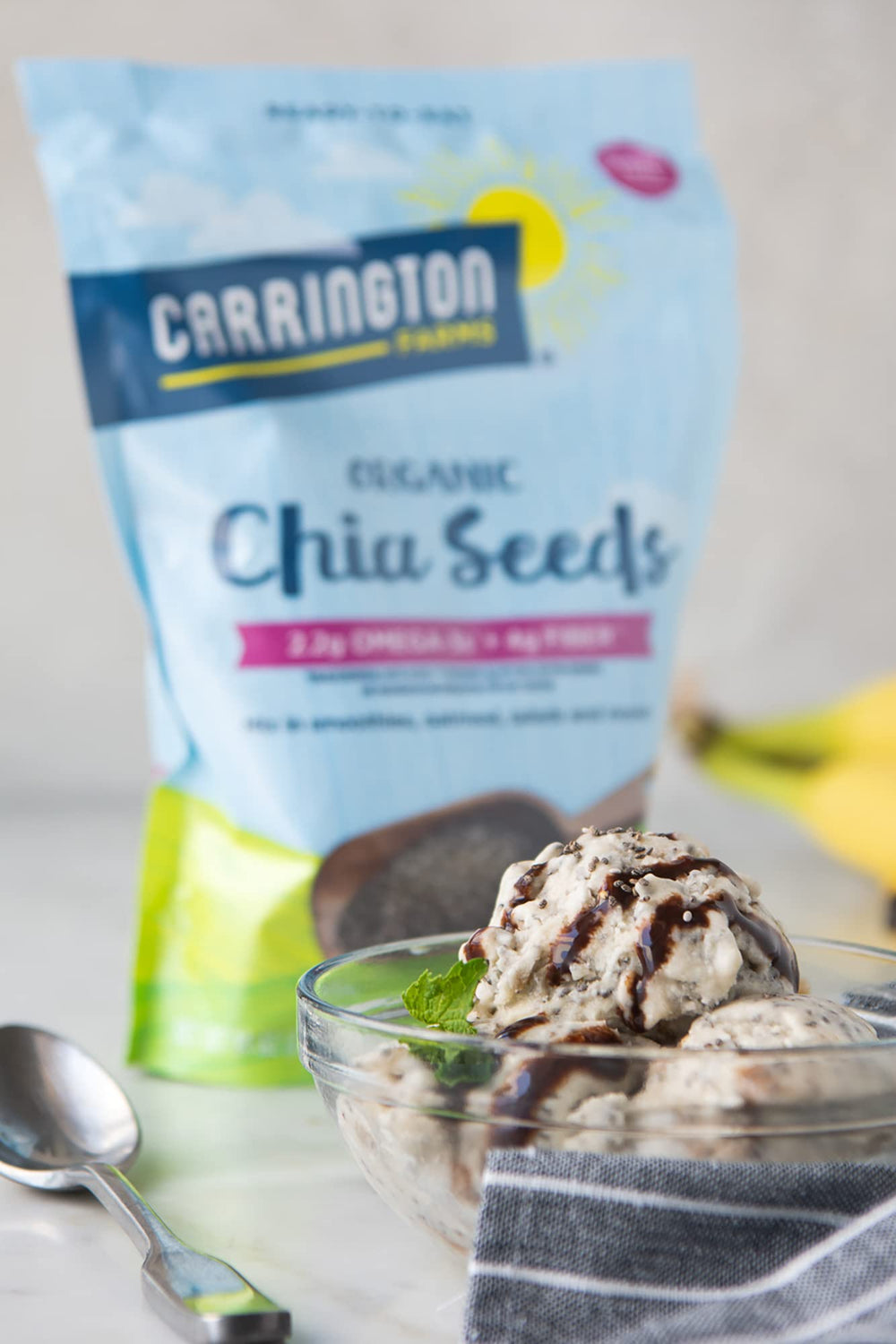 Scooped Carrington Farms chia seeds ready to sprinkle on cereal.