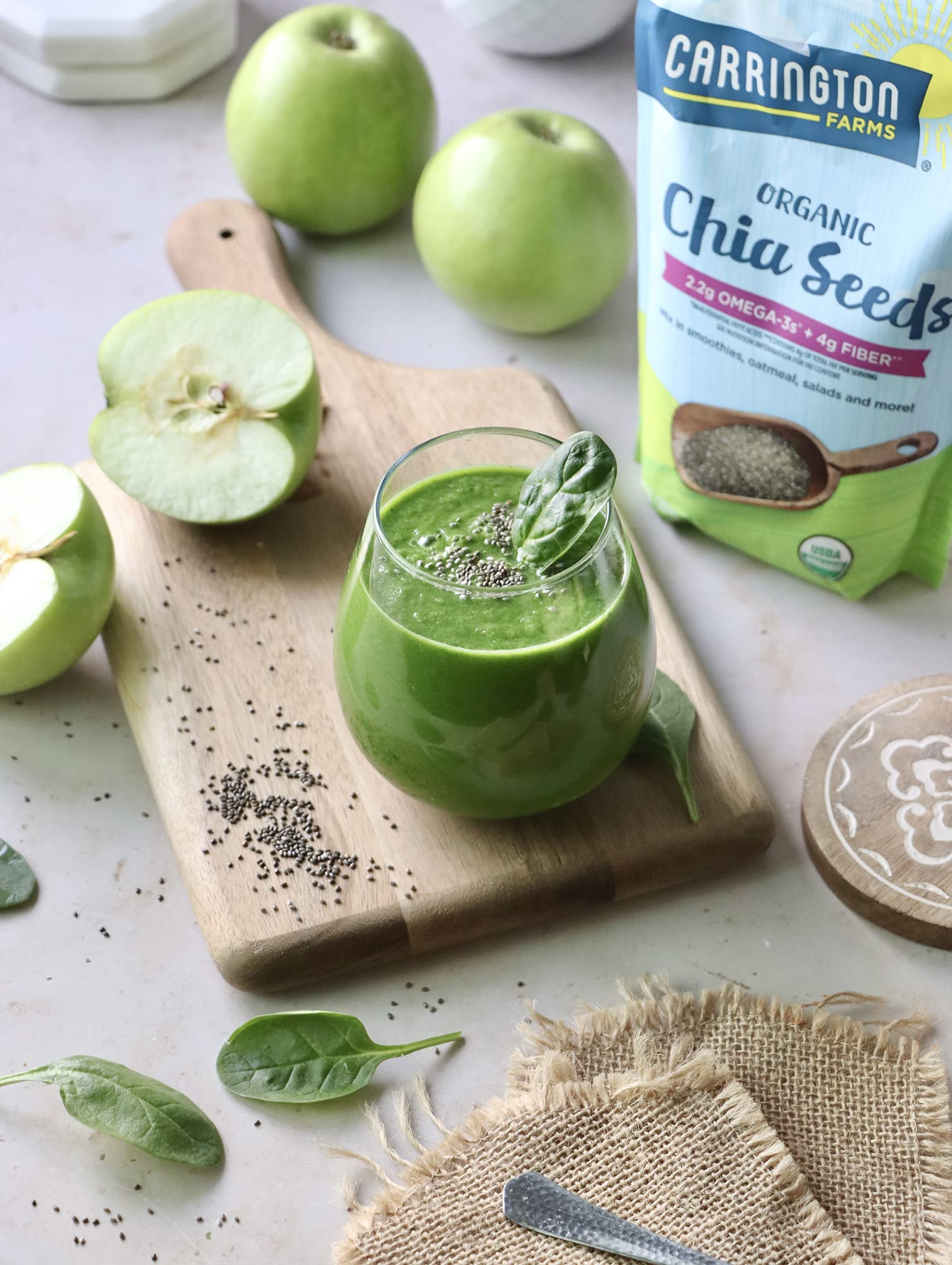 Chia seeds in a smoothie with Carrington Farms branding visible.