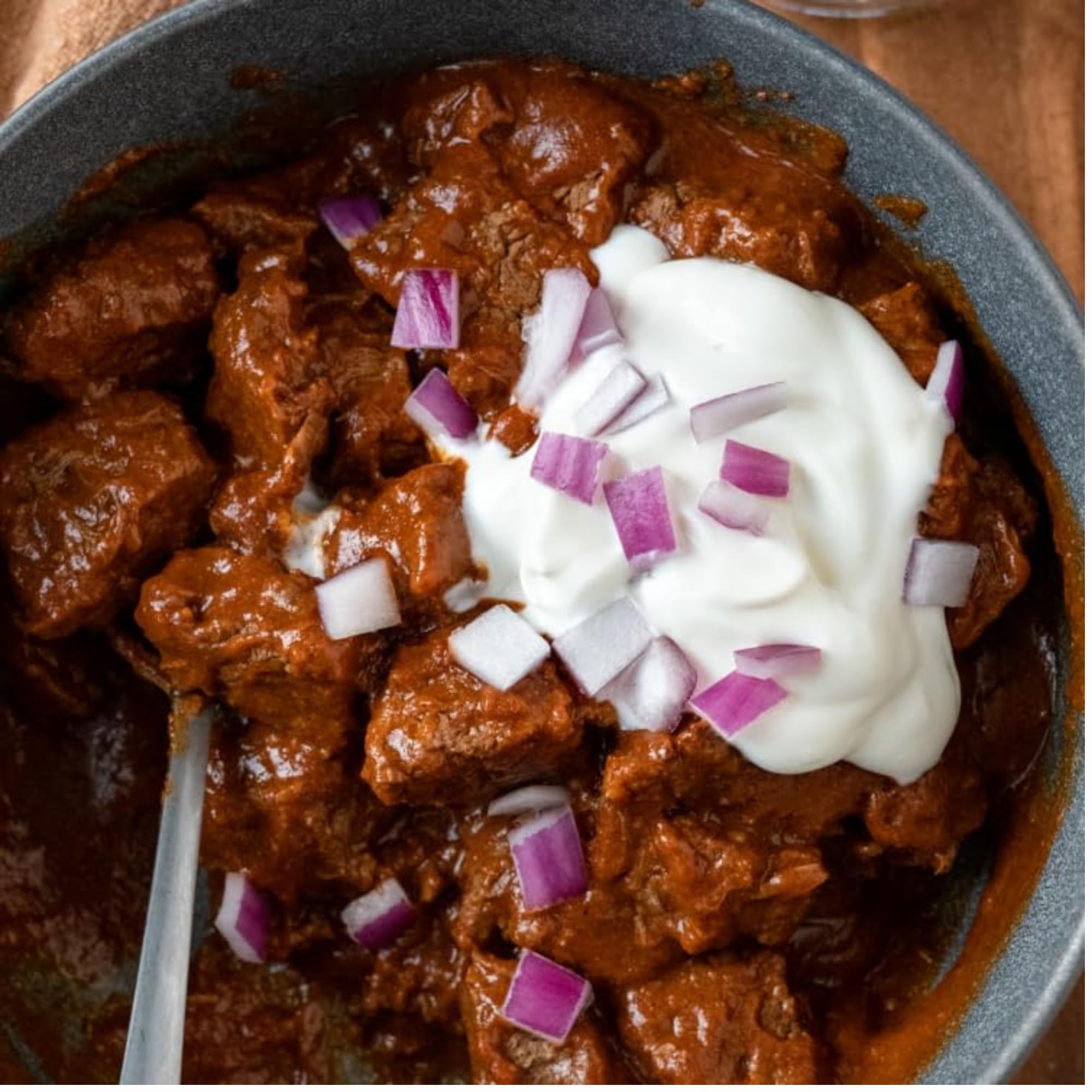 Chili topped on burgers and tacos using Carroll Shelby's kit.