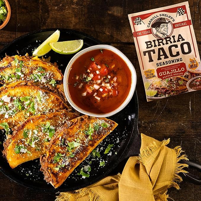 Birria nachos topped with meat seasoned by Carroll Shelby's blend