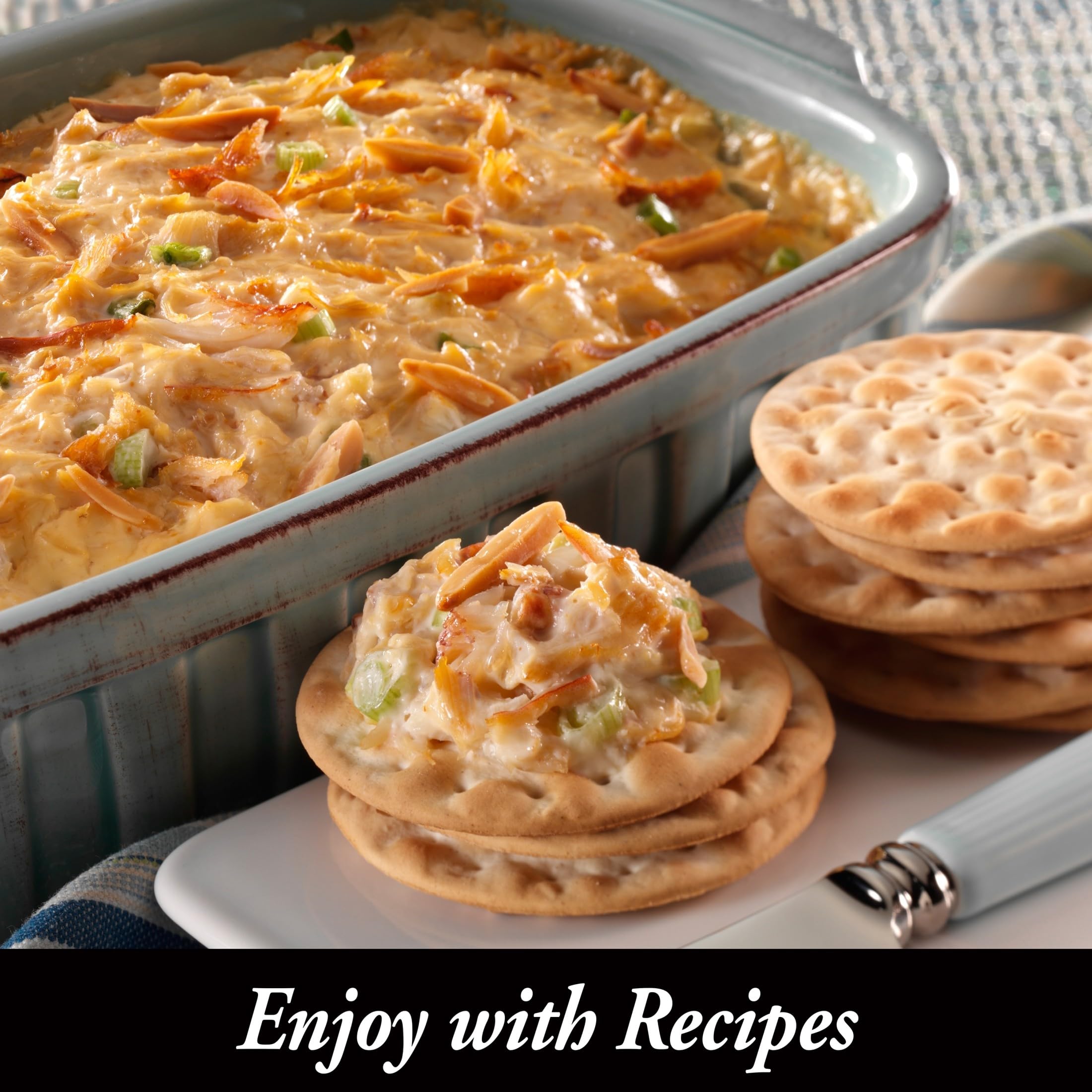 Picnic setup with Carr's crackers and toppings for outdoorsy snacking.