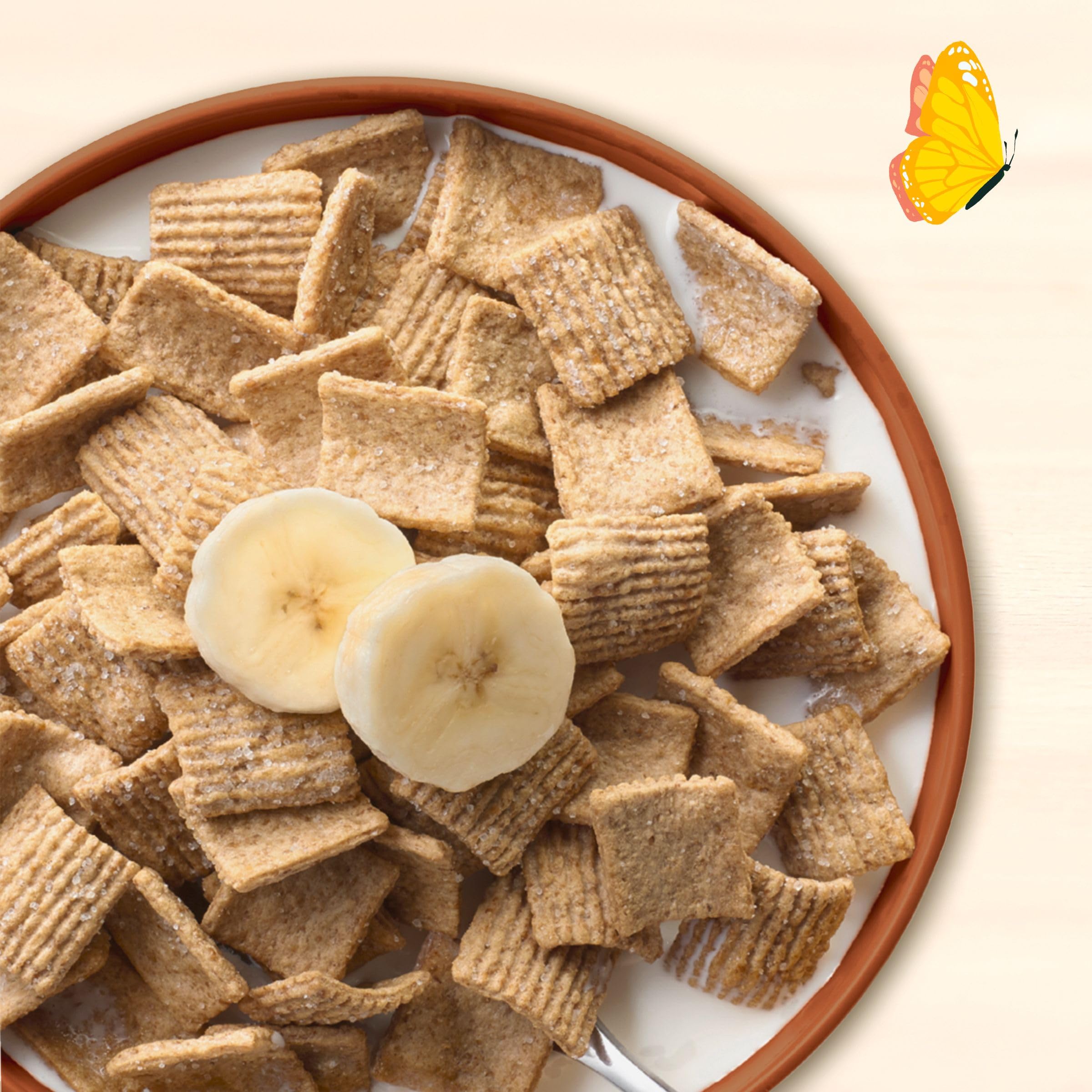 Serving bowl of Cascadian Farm Graham Crunch Cereal with milk.