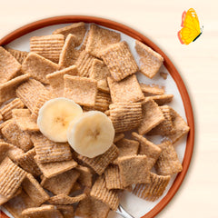 Serving bowl of Cascadian Farm Graham Crunch Cereal with milk.