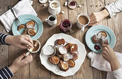 Castle Kitchen dairy-free hot chocolate served with topping, a comforting vegan treat.
