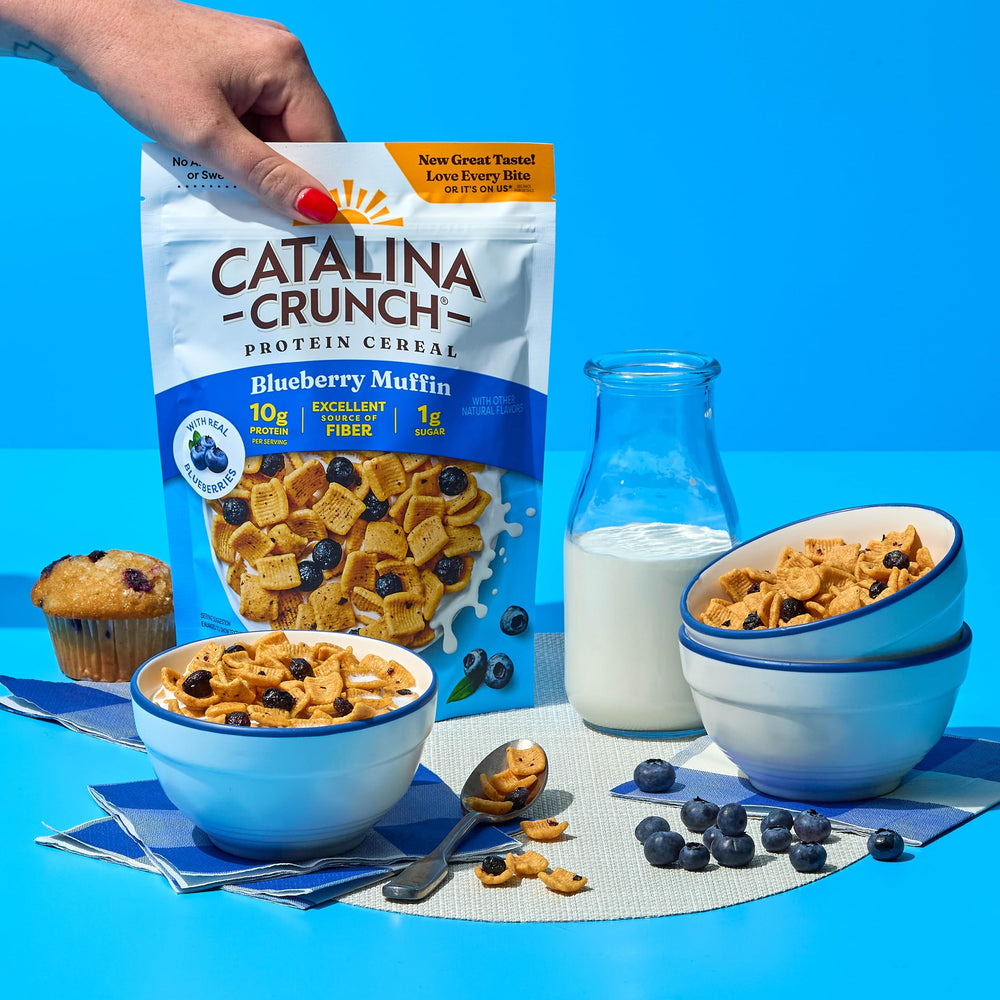 Catalina Crunch snack hero shown in hand for office, commute, or craving.