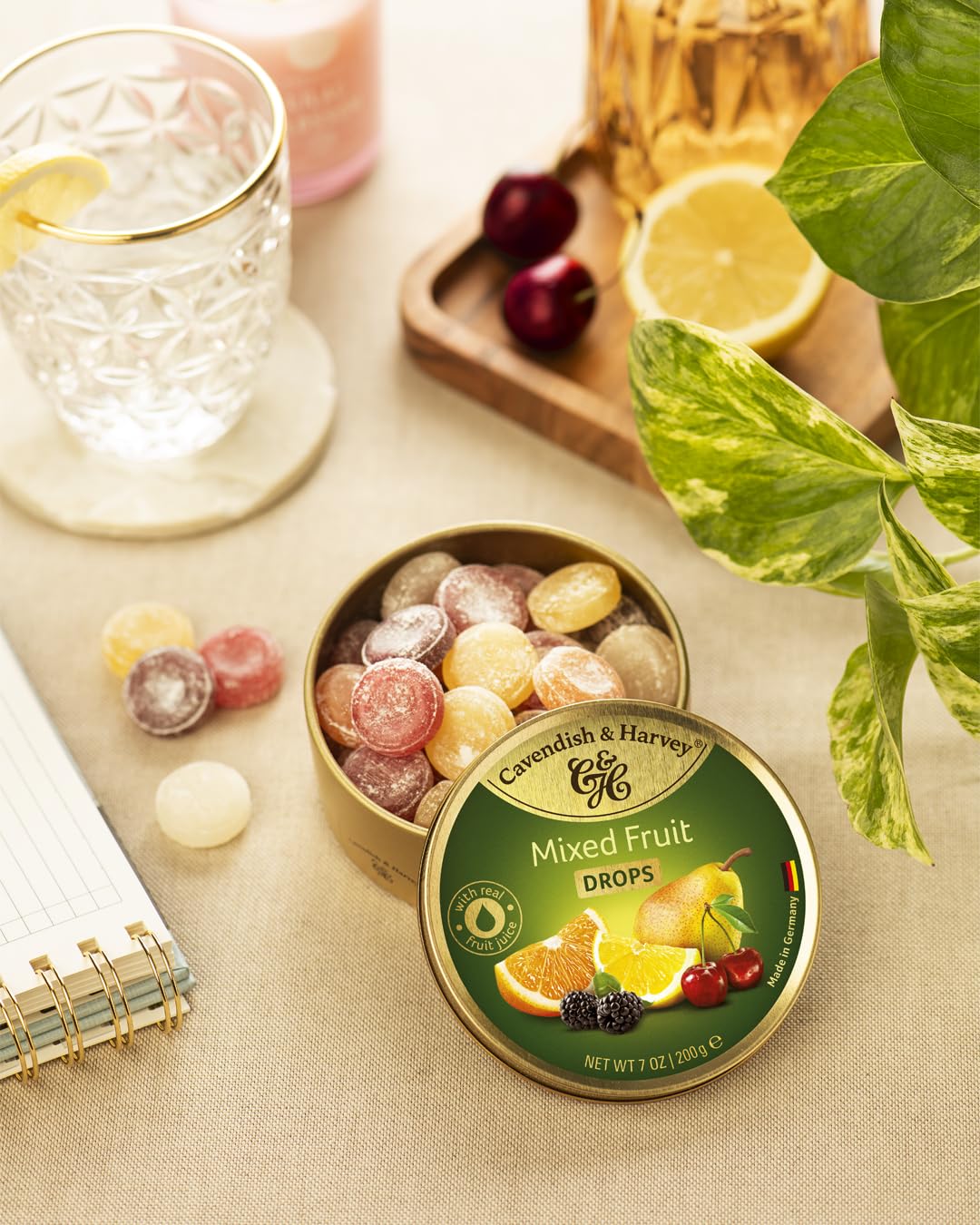 Open can reveals colorful fruit drops, perfect for quick, on-the-go treats.