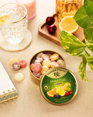 Open can reveals colorful fruit drops, perfect for quick, on-the-go treats.
