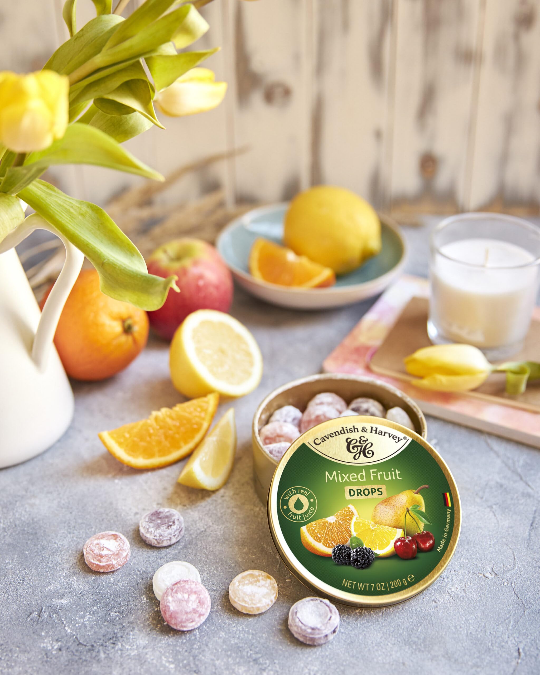 Cavendish & Harvey can beside cups, ideal for party or office snacking.