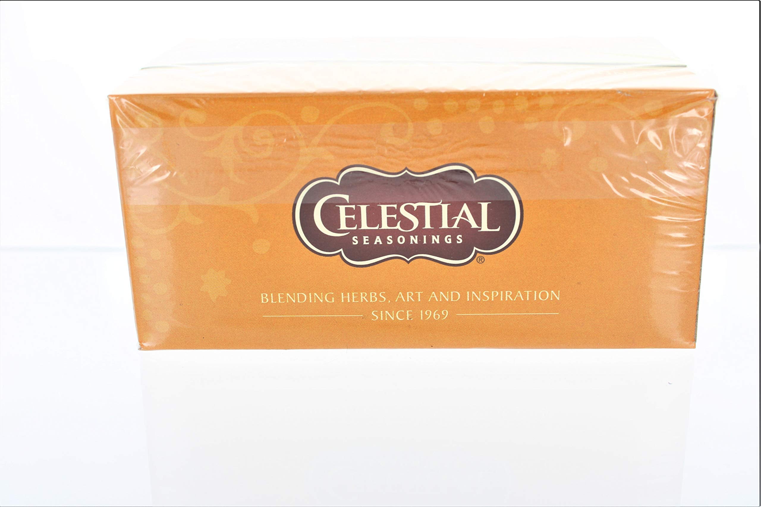 Close-up of Celestial Seasonings Honey Vanilla Chamomile Tea box highlights natural ingredients.
