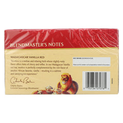 Cup of Celestial Seasonings Madagascar Vanilla Rooibos brew displaying warm amber color.