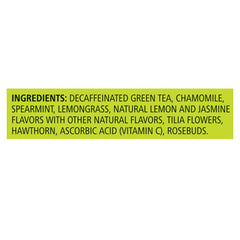 Cup with steaming pale green tea and lemon-jasmine aroma from Celestial Seasonings.
