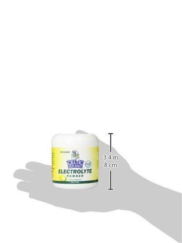 Celtic Sea Salt Electrolyte Powder poured into glass with water suggests easy mixing.