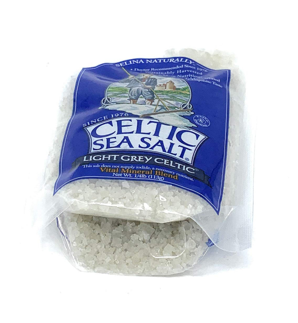 Kitchen jar of Celtic Sea Salt light grey coarse salt ready for cooking and finishing.