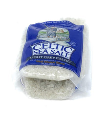 Kitchen jar of Celtic Sea Salt light grey coarse salt ready for cooking and finishing.