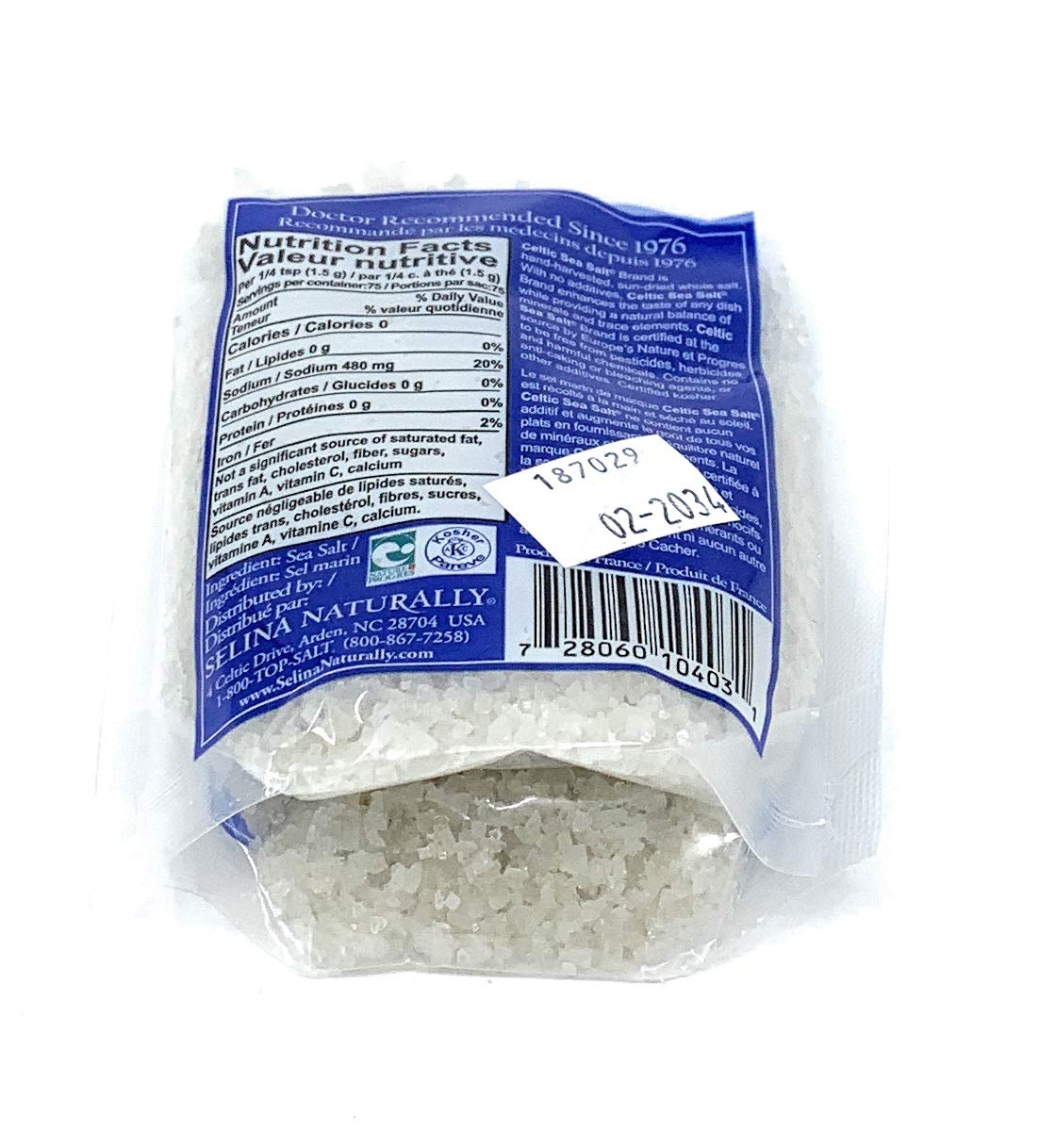 Scoop of Celtic Sea Salt light grey coarse salt enhances recipes.