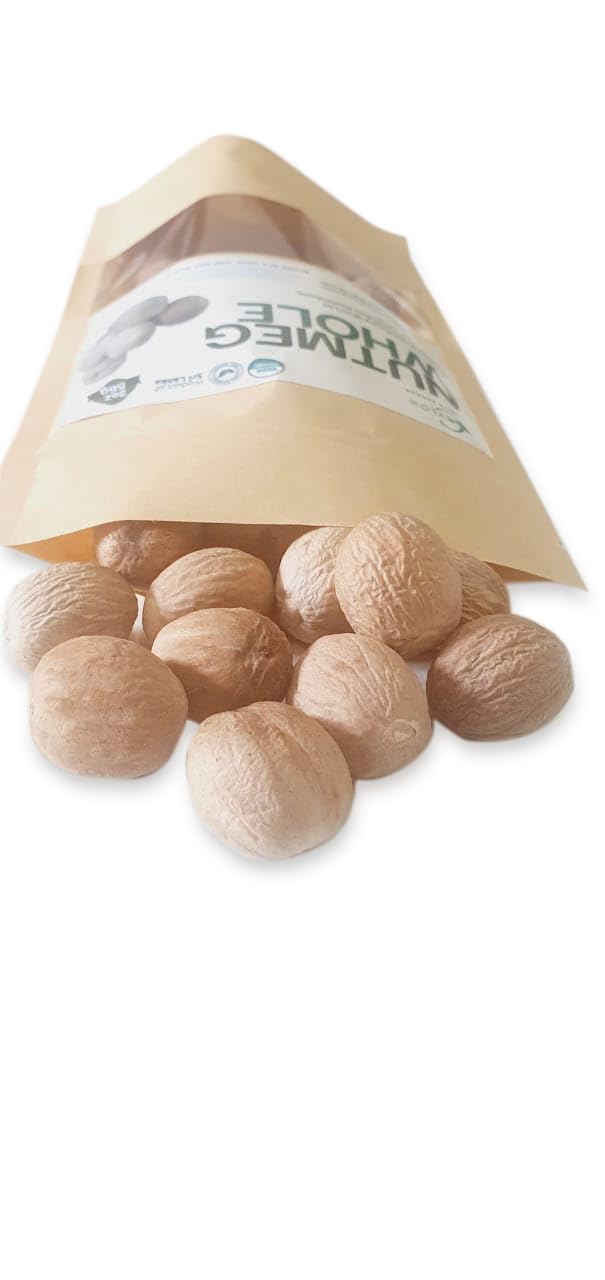 Cook preparing a dish with Ceylon Rustic Savour Organic Nutmeg for flavor depth