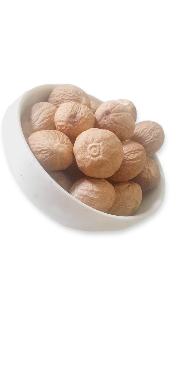 Nutmeg being ground from Ceylon Rustic Savour for fresh aroma in cooking