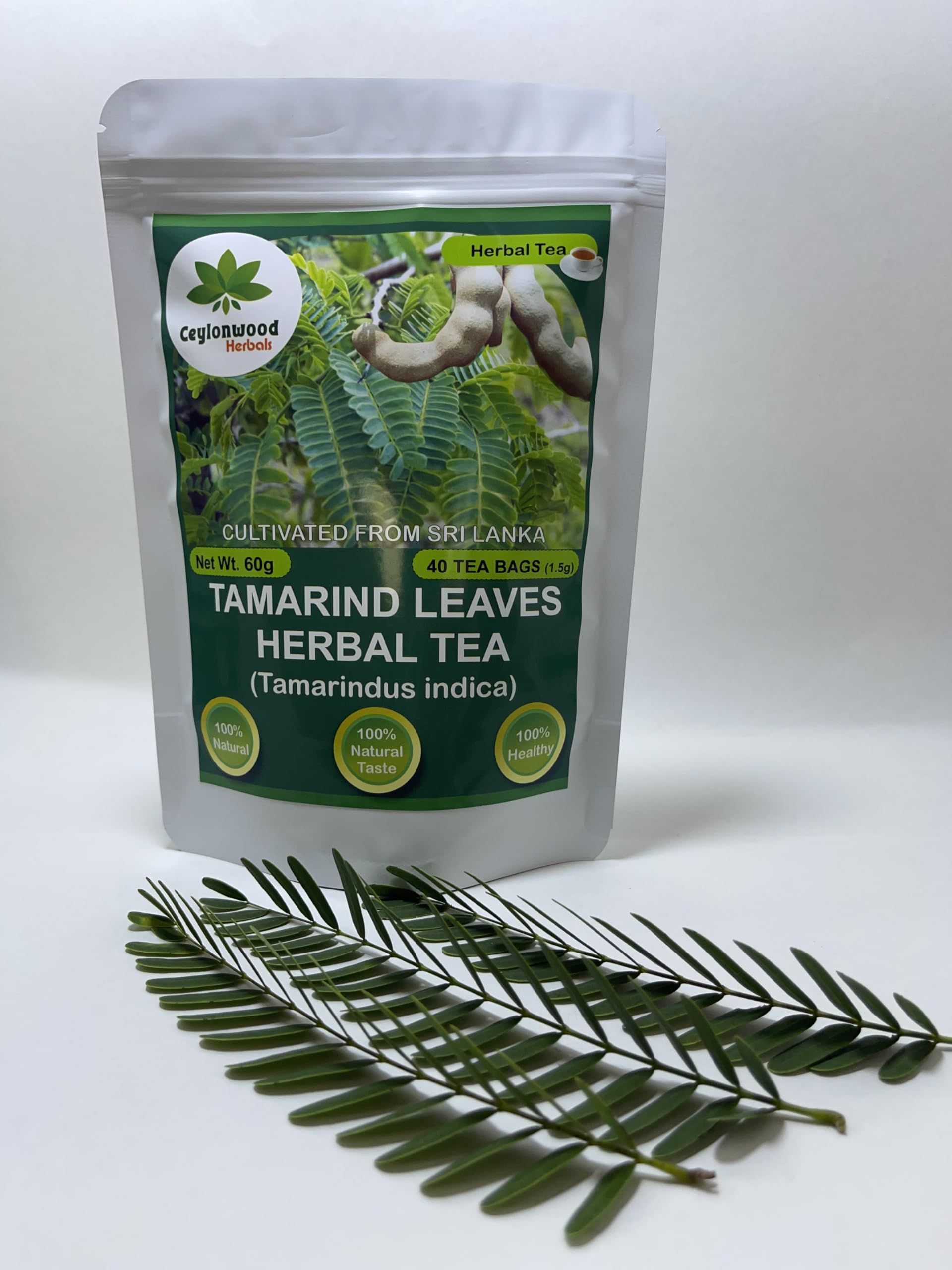 Close-up of tamarind leaves by Ceylonwood Herbals, natural greens for herbal infusion