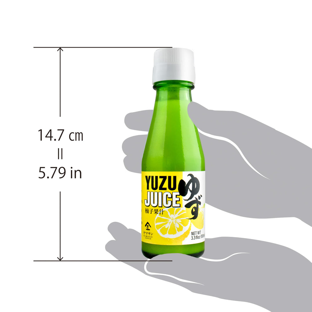 Chaganju Yuzu juice bottle being poured, highlighting citrus aroma for drinks and recipes.