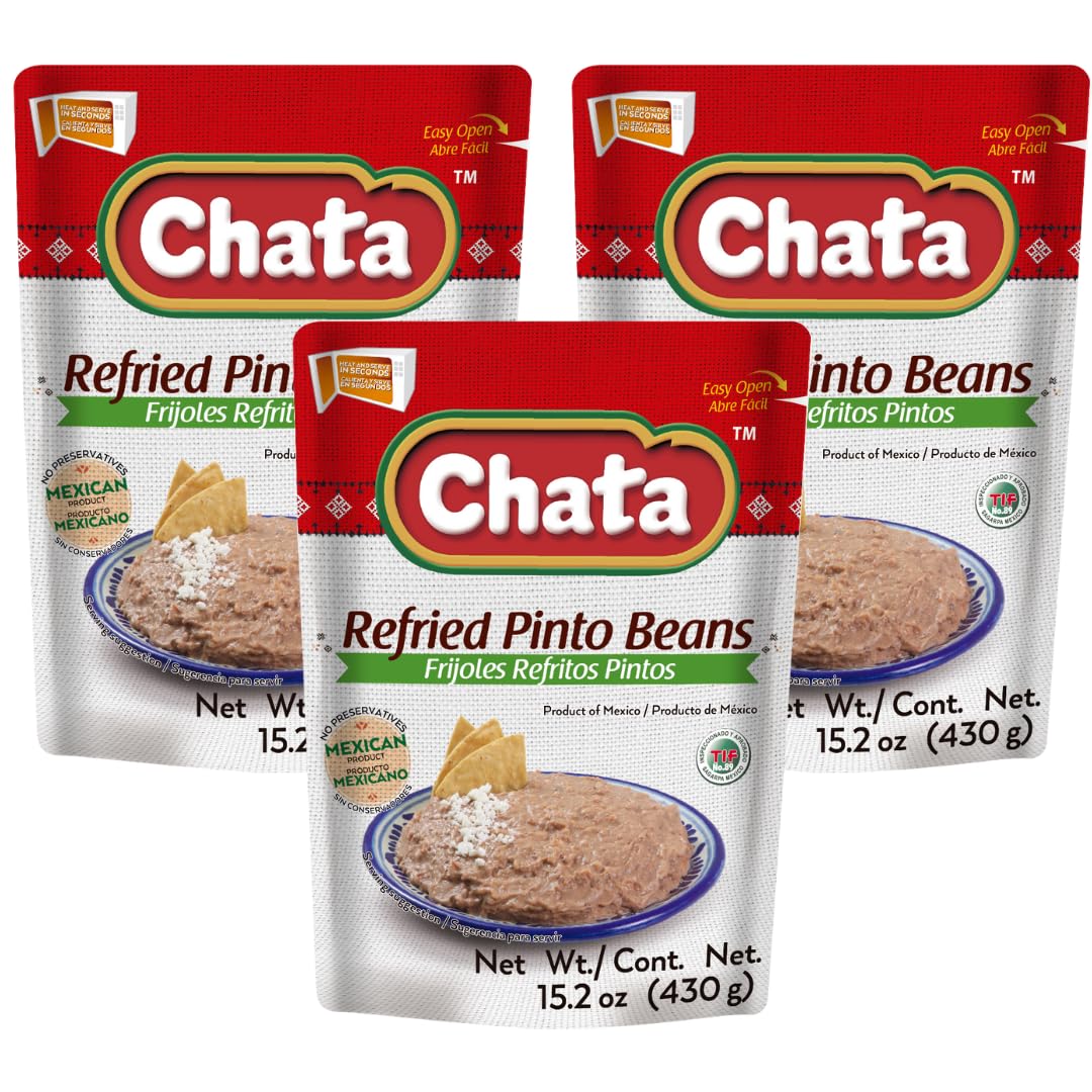 Chata refried pinto beans three-pack on a plate, creamy traditional flavor ready to enjoy.