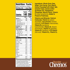 Pouring milk over Cheerios Chocolate cereal for a quick gluten-free breakfast.