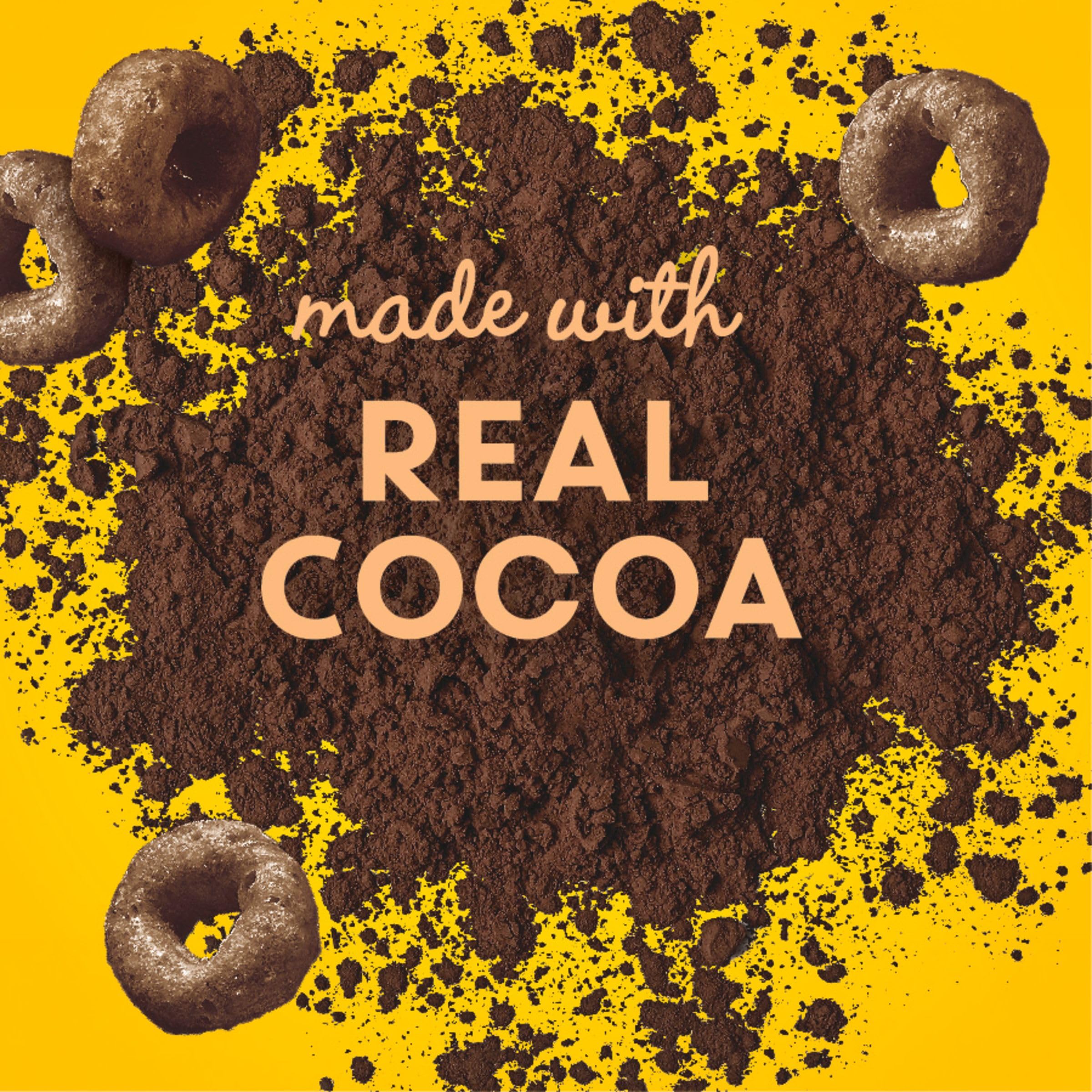 Spoon dipping into Cheerios Chocolate bowl highlighting crunchy texture