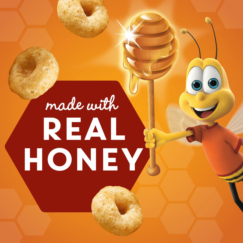 Cheerios Honey Nut cereal cup in a bowl shows crunchy texture and honey flavor.
