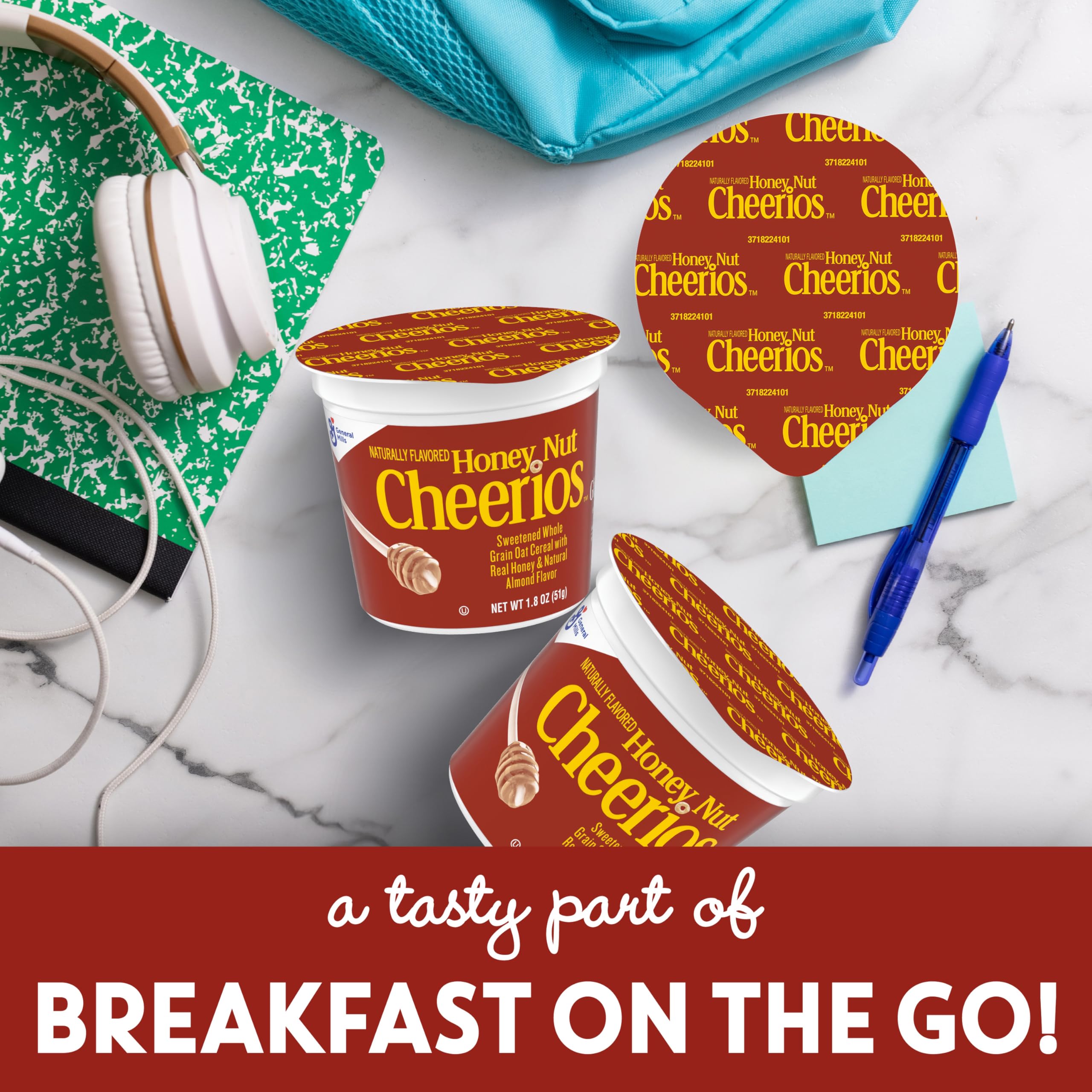 Cheerios Honey Nut cereal cup with lid on for quick, mess-free serving.