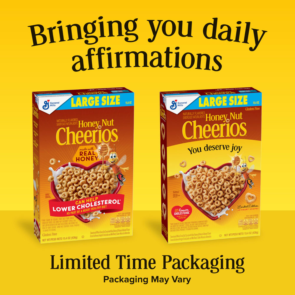 Pouring Cheerios Honey Nut into a bowl from the box.